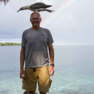 Eric with a Red-footed Booby on Palmyra Atoll